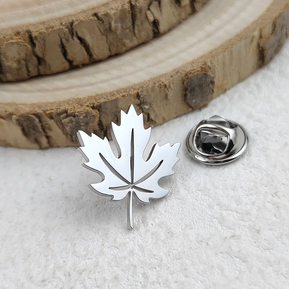 Creative maple leaf hollow design stainless steel 18K brooch, wear in the ceremony scene