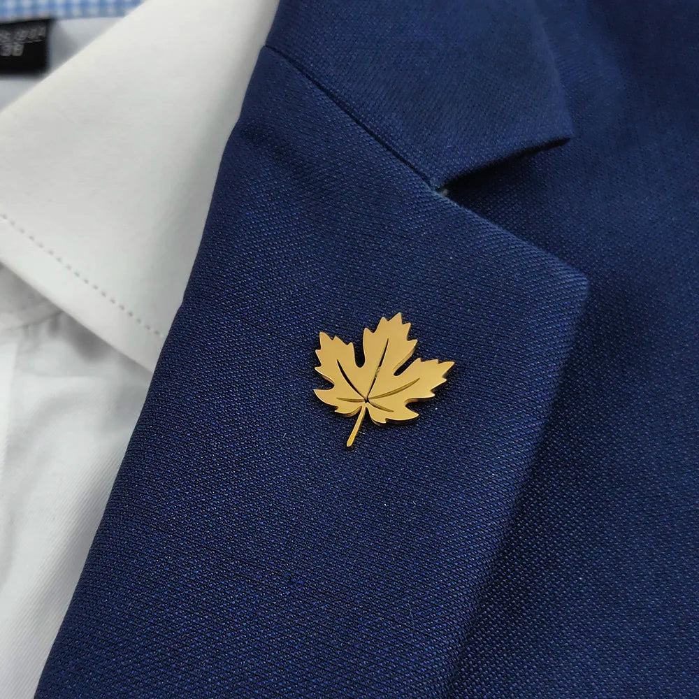 Creative maple leaf hollow design stainless steel 18K brooch, wear in the ceremony scene