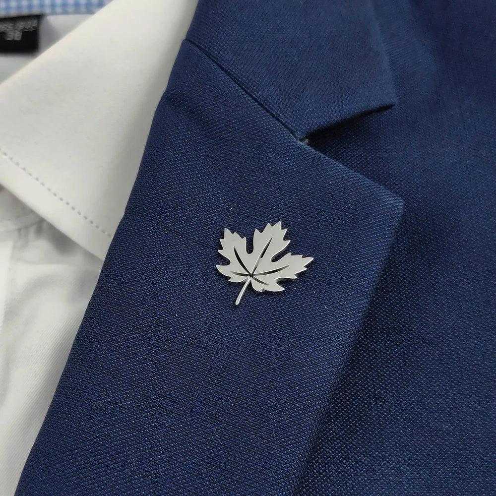 Creative maple leaf hollow design stainless steel 18K brooch, wear in the ceremony scene