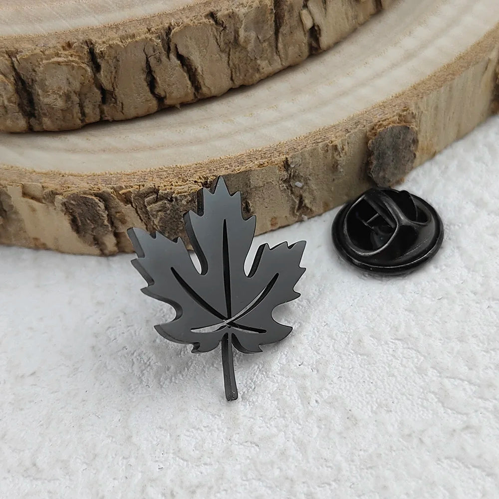 Creative maple leaf hollow design stainless steel 18K brooch, wear in the ceremony scene