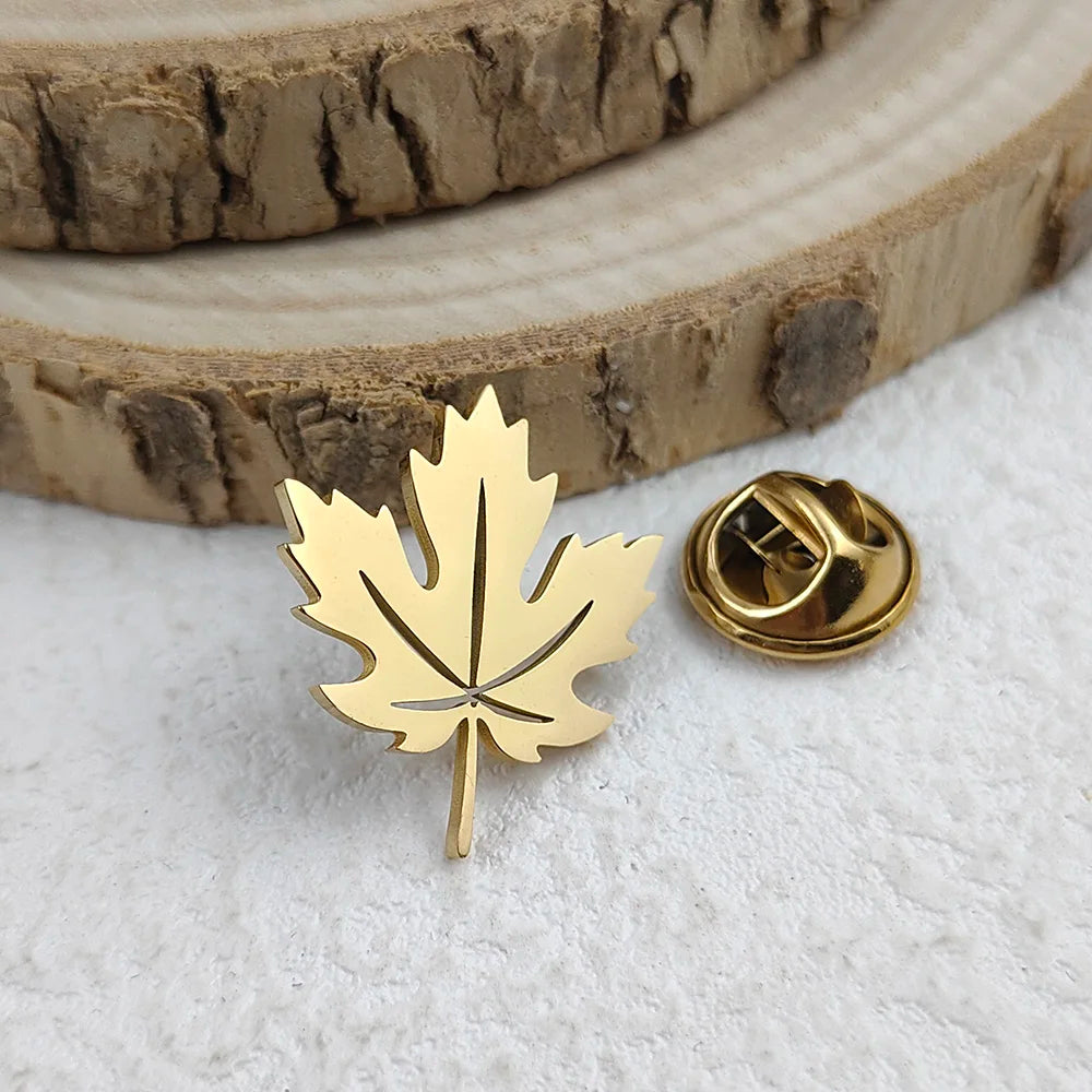 Creative maple leaf hollow design stainless steel 18K brooch, wear in the ceremony scene